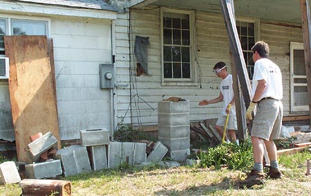 Tearing the chimney down